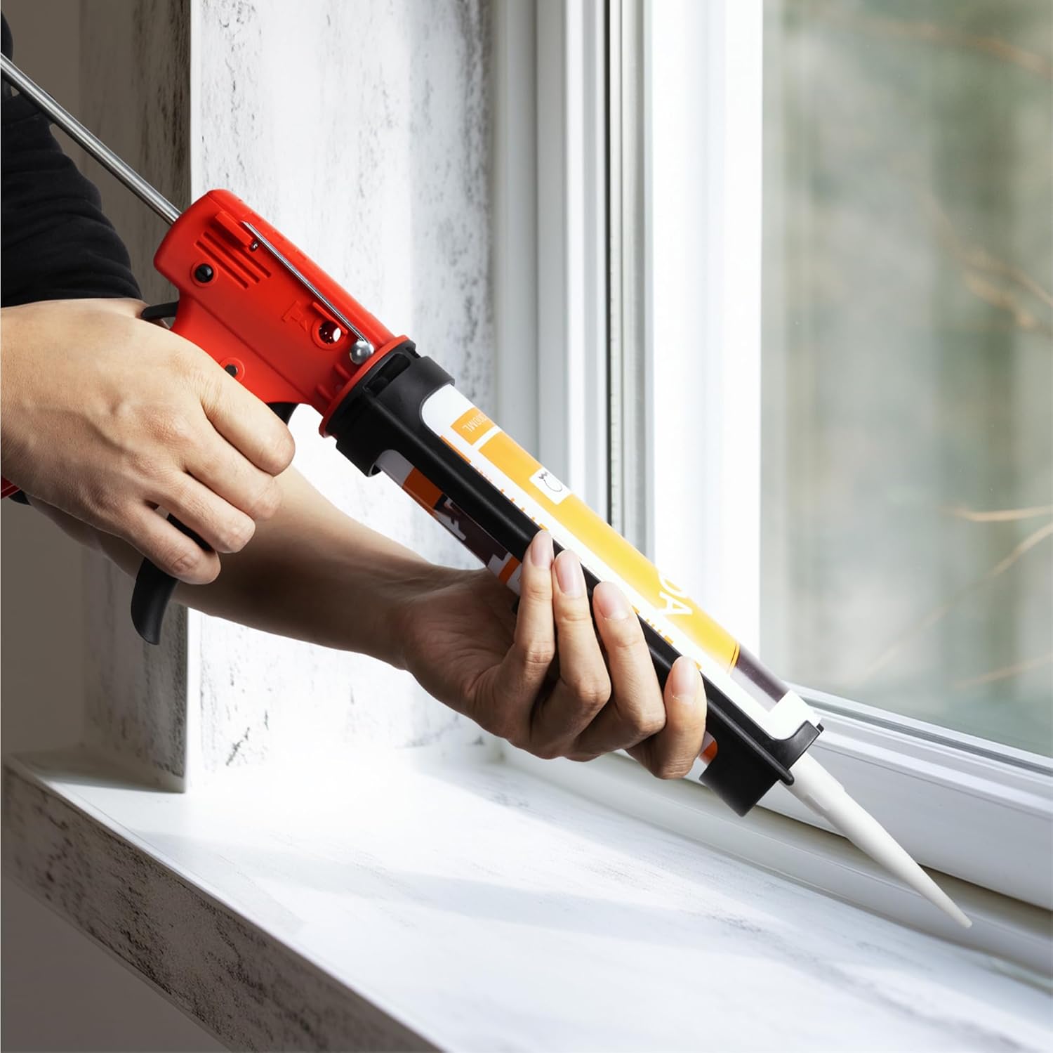 Applying sealant with a caulking gun