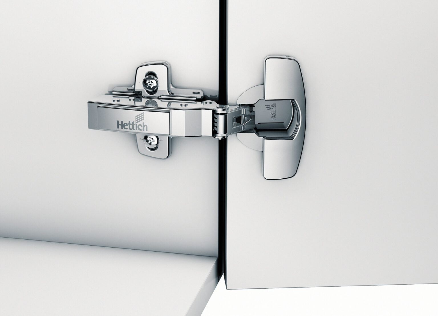 A Hettich Sensys hinge on a modern cabinet