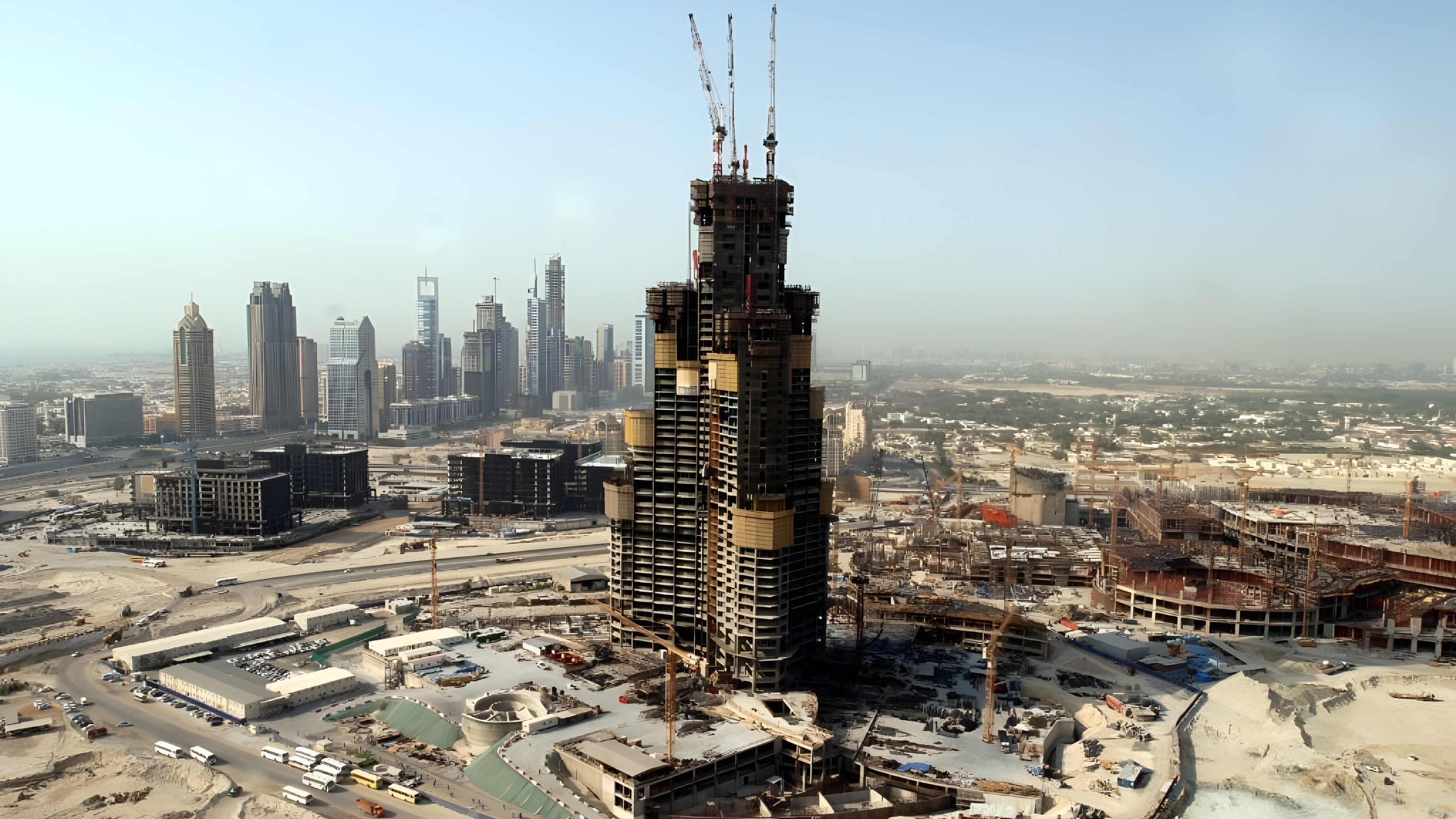 A construction site in the UAE with the city skyline in the background